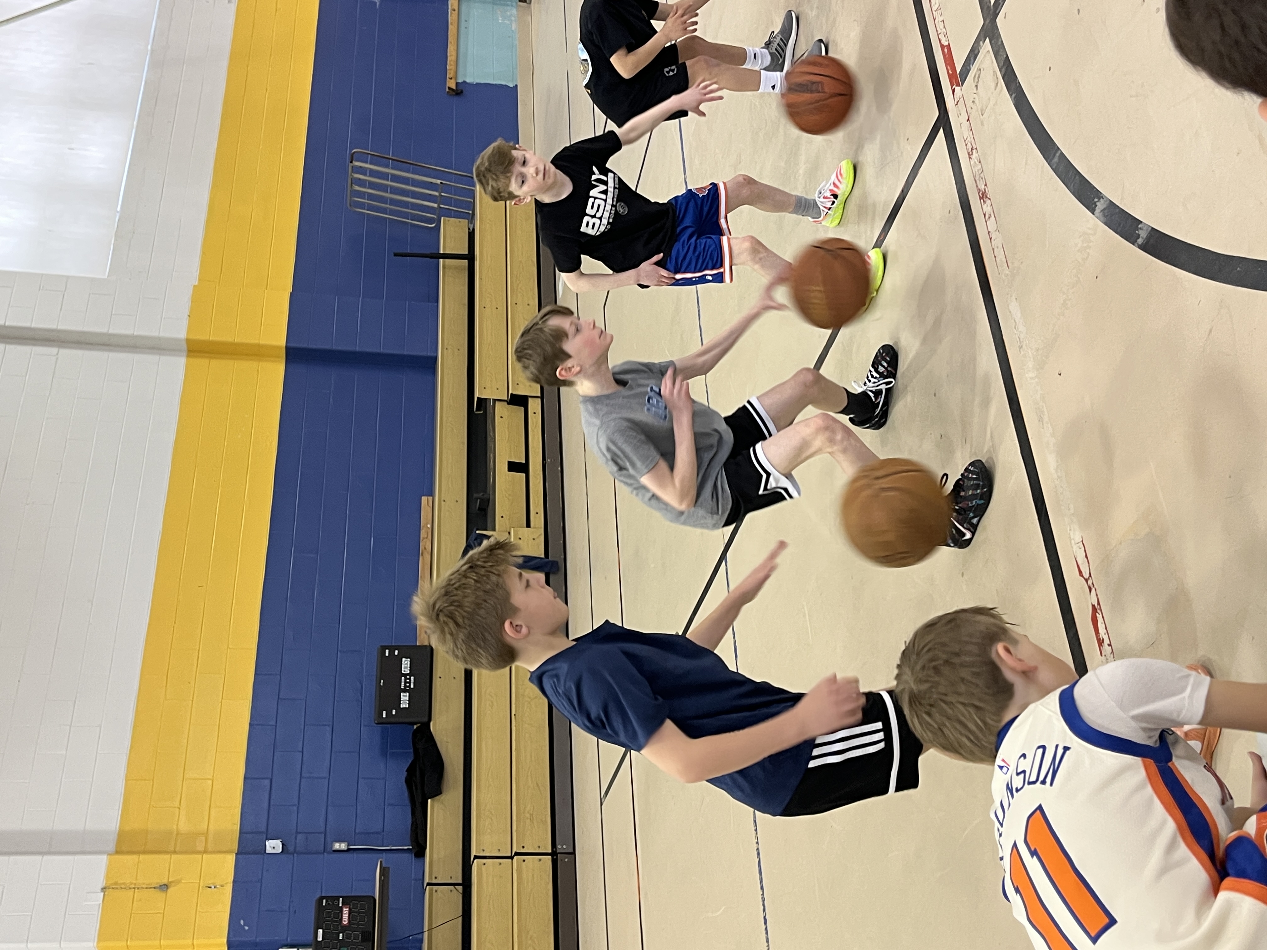 Campers working on dribbling drills